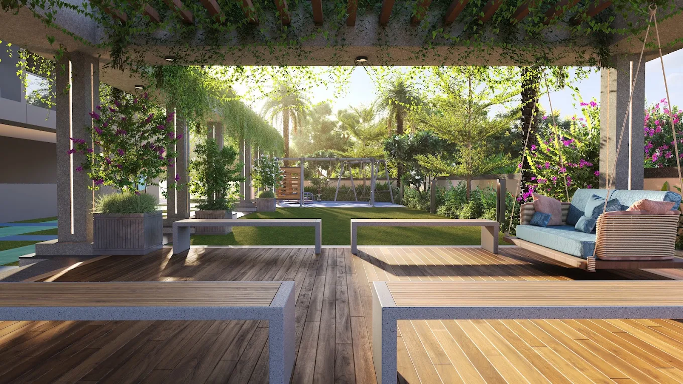 Landscaped pergola seating and children's play garden at Blue Ocean